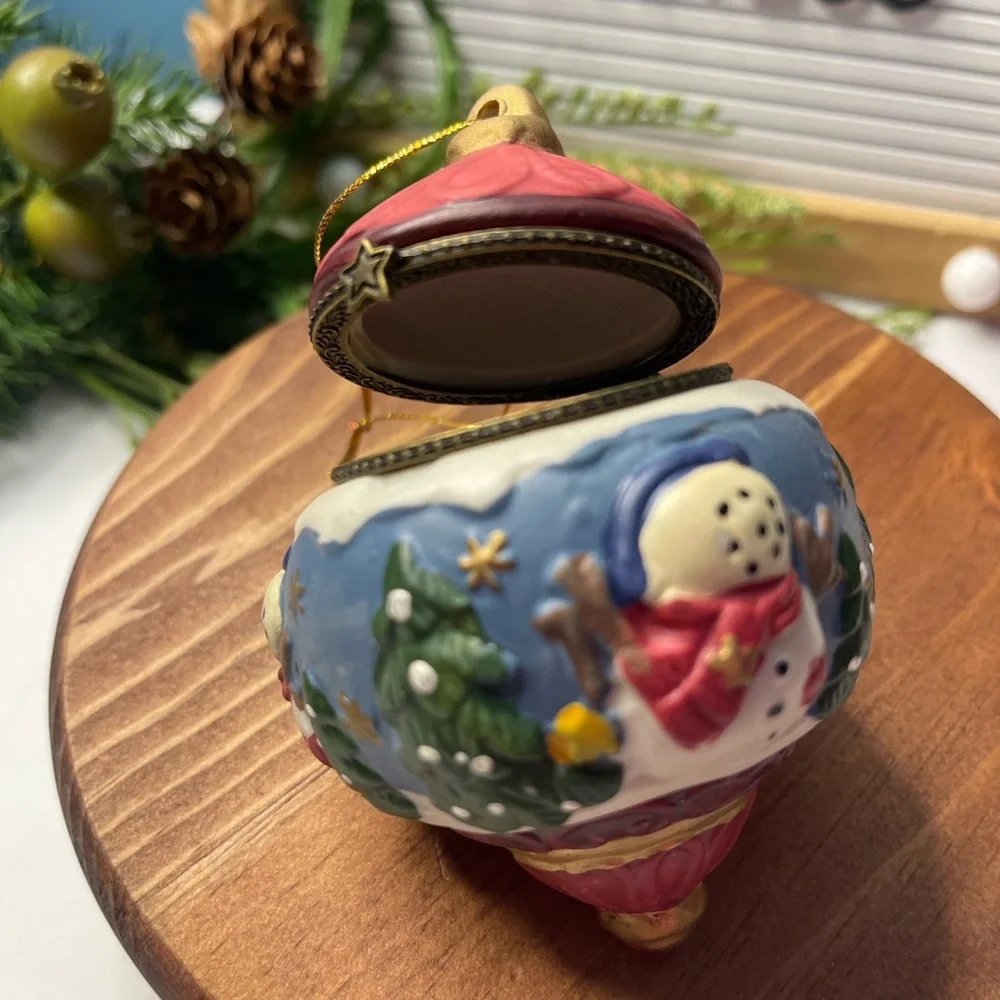 Festive Snowman Ornament with Red and Blue Accents